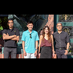 photo of 4 members of the murthy lab standing outside