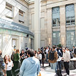 a crowd in the tmec atrium at harvard medical school