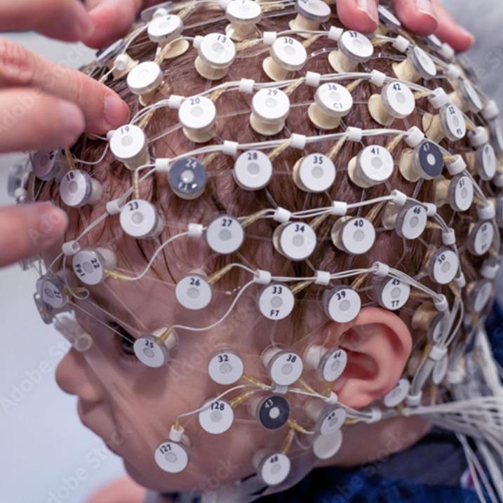 a child with an eeg helmet on