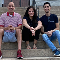 Eddie Rodriguez, Caroline Palavicino-Maggio, Michael Mazzola sitting outside HMS