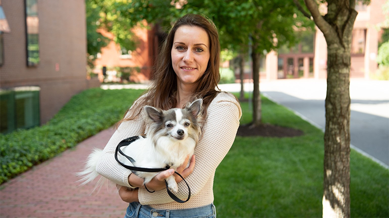photo of melina cordeau holding her dog