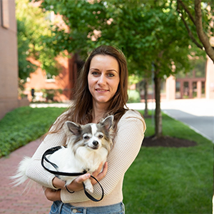 photo of melina cordeau holding her dog
