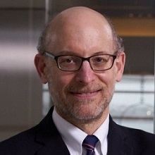 Portrait of Andrew Nierenberg in his lab