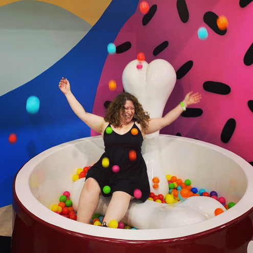 a person in a ball pit