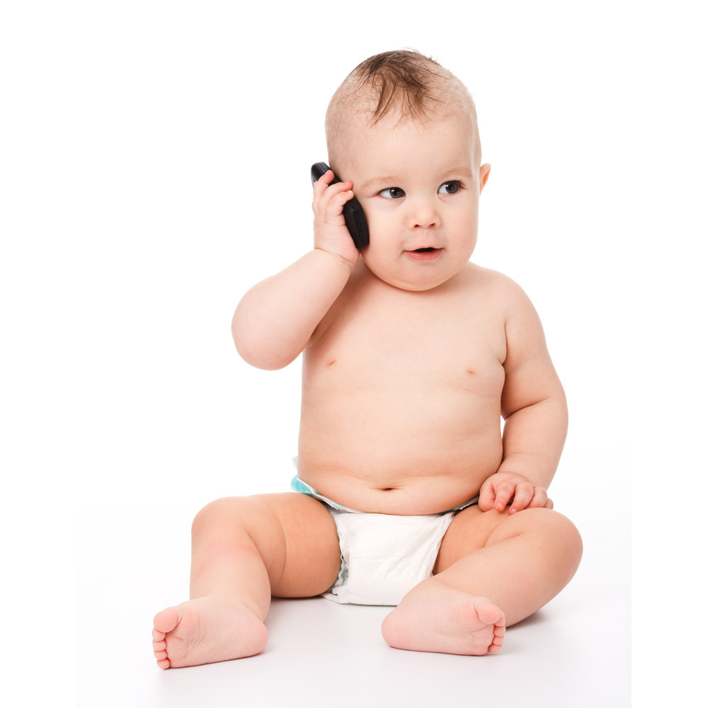 little baby is talking on cell phone