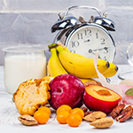 fruit, milk, and a clock
