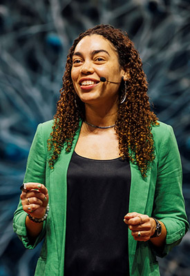 photo of aleena garner speaking at TedX New England