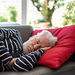 a man napping on the couch