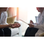 a patient talking to a nurse