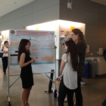 a person presenting a poster