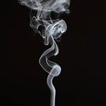 cigarette smoke on a black background